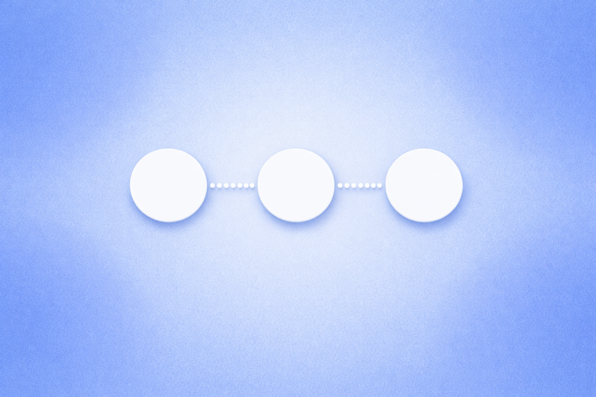 A clean workspace with a notepad, laptop, and coffee cup, representing organization and tailored outreach strategies